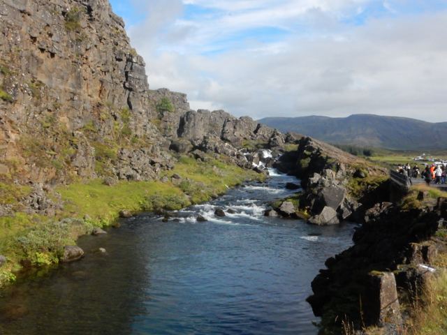 A river running through a lava-rock gorge