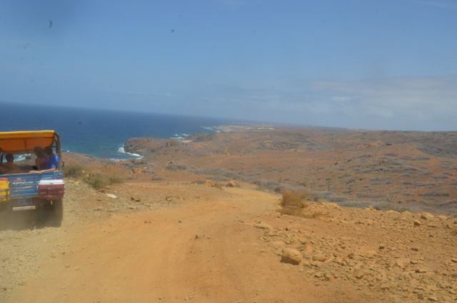 A dirt track winding along the dry coast