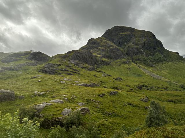 A rounded green mountain in the Highlands